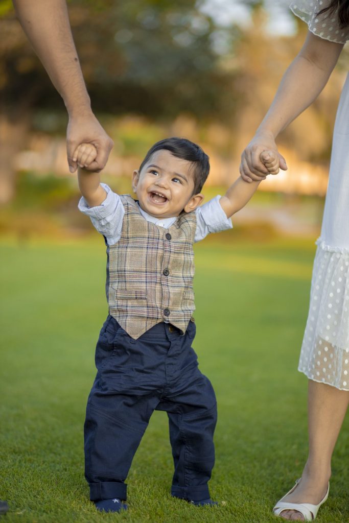 family playing at a park in Dubai during a family photography session
