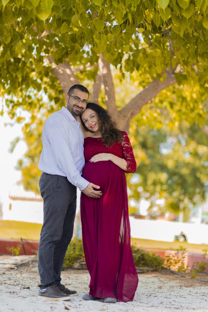 Maternity Photoshoot in dubai - Hey daddy, I'm kicking mamma, can you feel it?