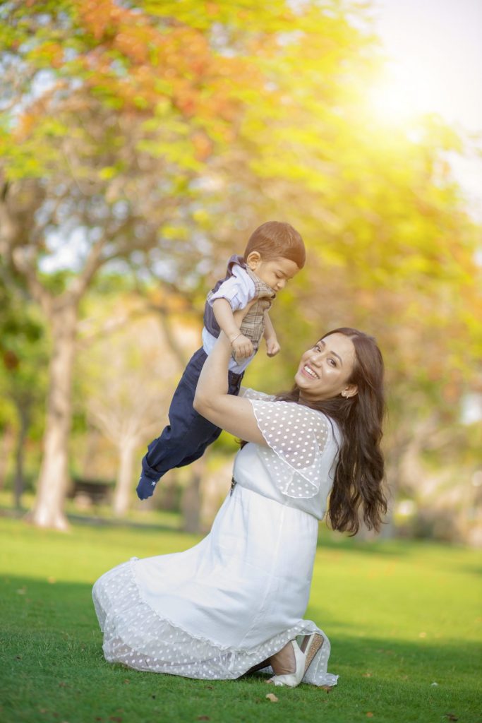 Mother and son having a picnic during a family photography session in Dubai
